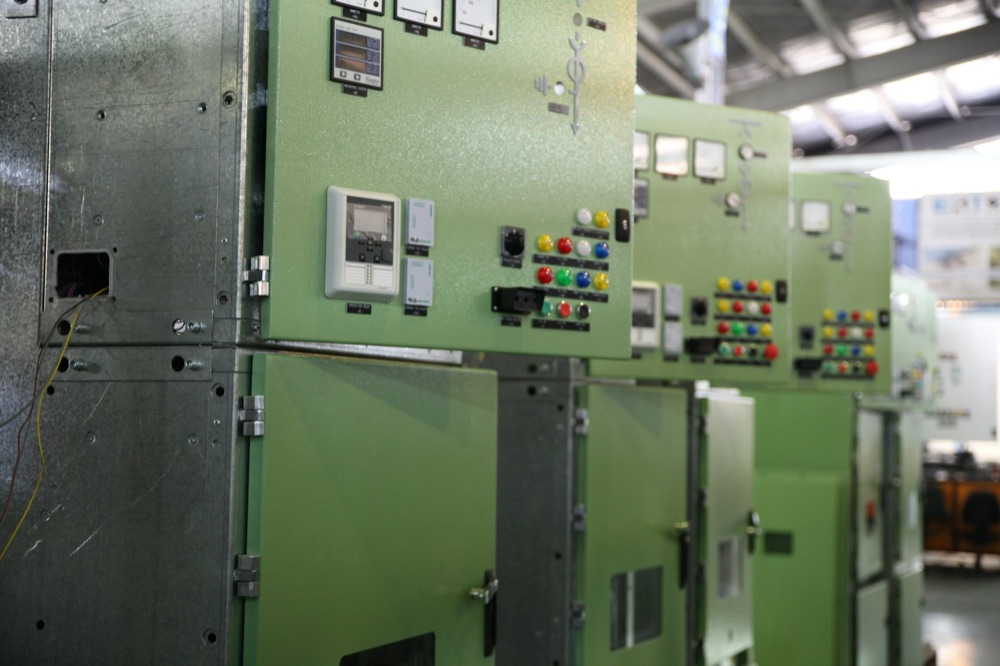 Commercial three-phase electrical distribution and motor control wiring in a London facility