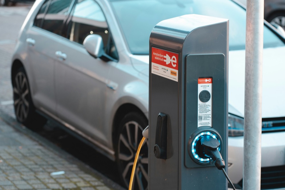 Level 2 EV charger installed on a dedicated circuit at a home garage